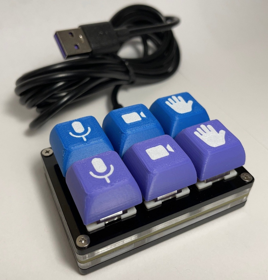 MuteKeys keypad with blue Zoom and purple Teams keys